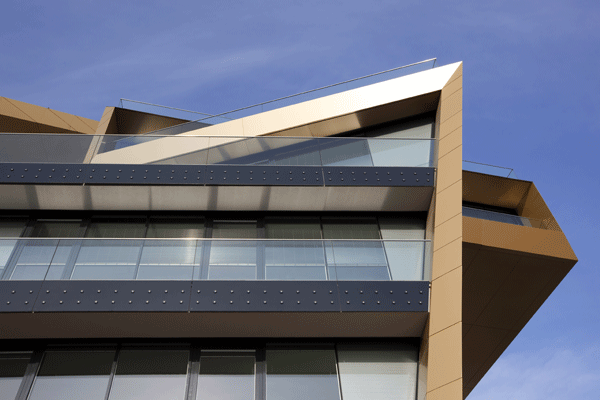 ALUCOBOND® sandwichpanelen gold metallic doet denken aan munten en bankwezen ALUCOBOND® sandwichpanelen gold metallic doet denken aan munten en bankwezen