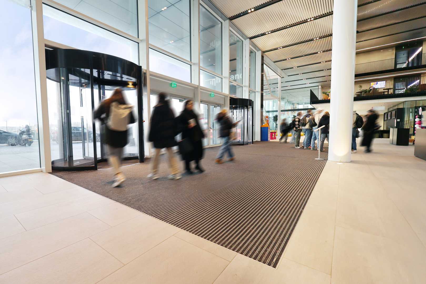 Storax entreemat Combimat tapijt Mensen bij ingang op entreemat