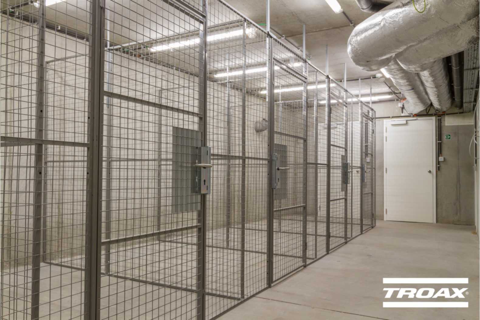 Troax Cetus: bergingen voor appartementengebouwen Kelderberging met kooien