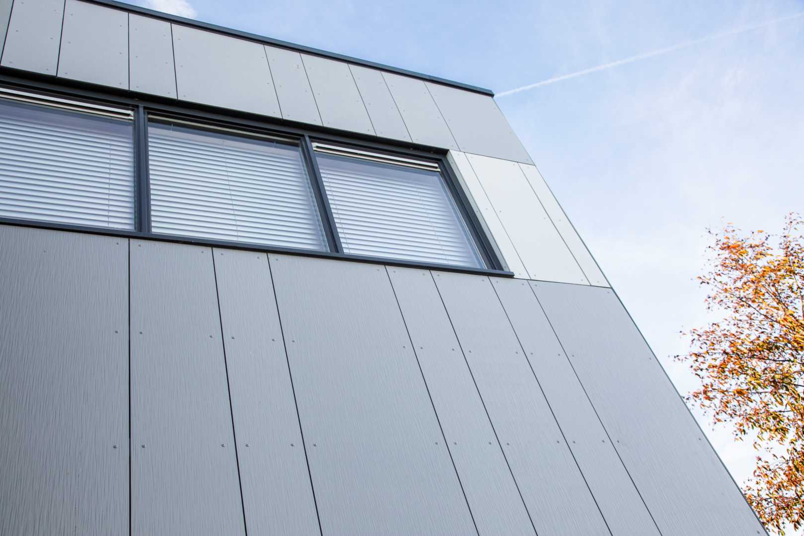 Hardie® Architectural Panel voor Stam Montagebouw Gevel gerenoveerd met brandwerende gevelplaten