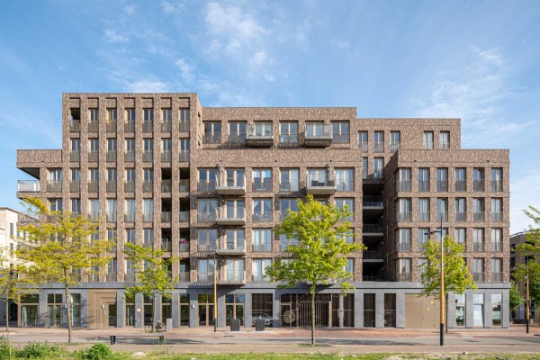 Sto Isoned B.V. | NBD Nederlandse Bouwdocumentatie gebouw met natuursteen gevel