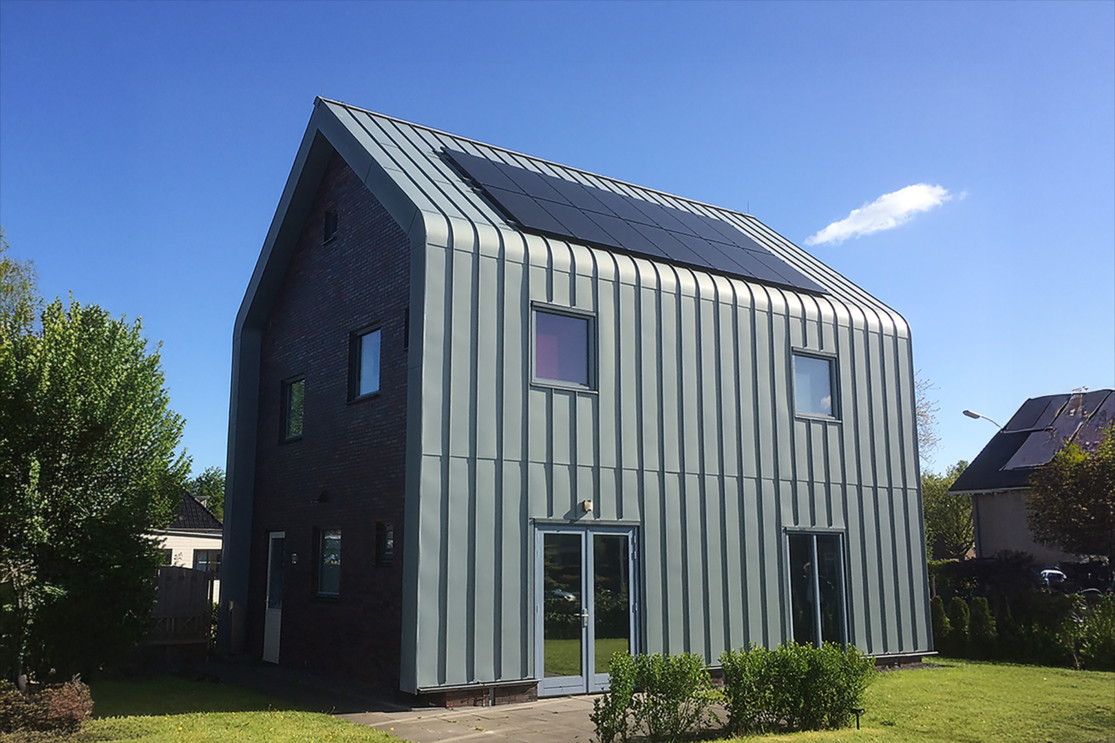 Actiefhuis, Drachten, Nederland - RHEINZINK prePATINA ECO ZINC graphite-grey Woning met zinken dak