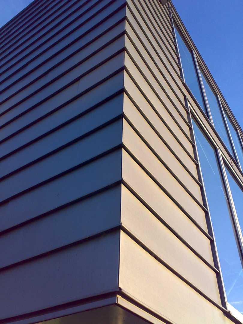 5.Bosbaan, Amsterdam, Nederland - RHEINZINK prePATINA ECO ZINC blue-grey - Ridder Skins for Buildings gebouw met zinken gevel