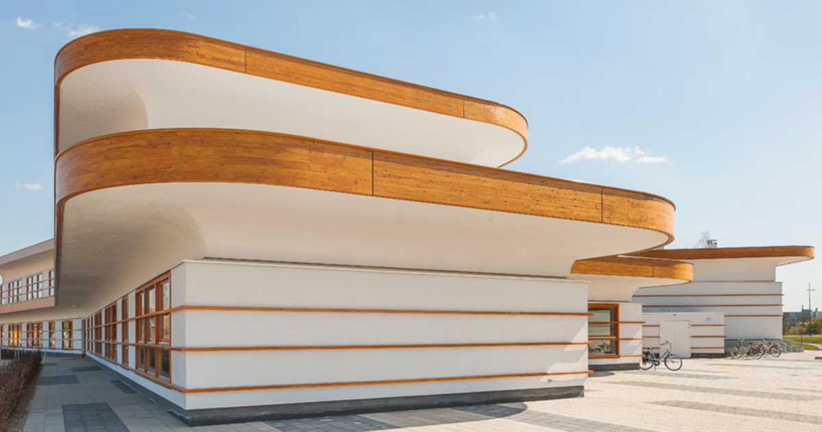 Knauf B.V. | NBD Nederlandse Bouwdocumentatie gebouw met gebogen gevel