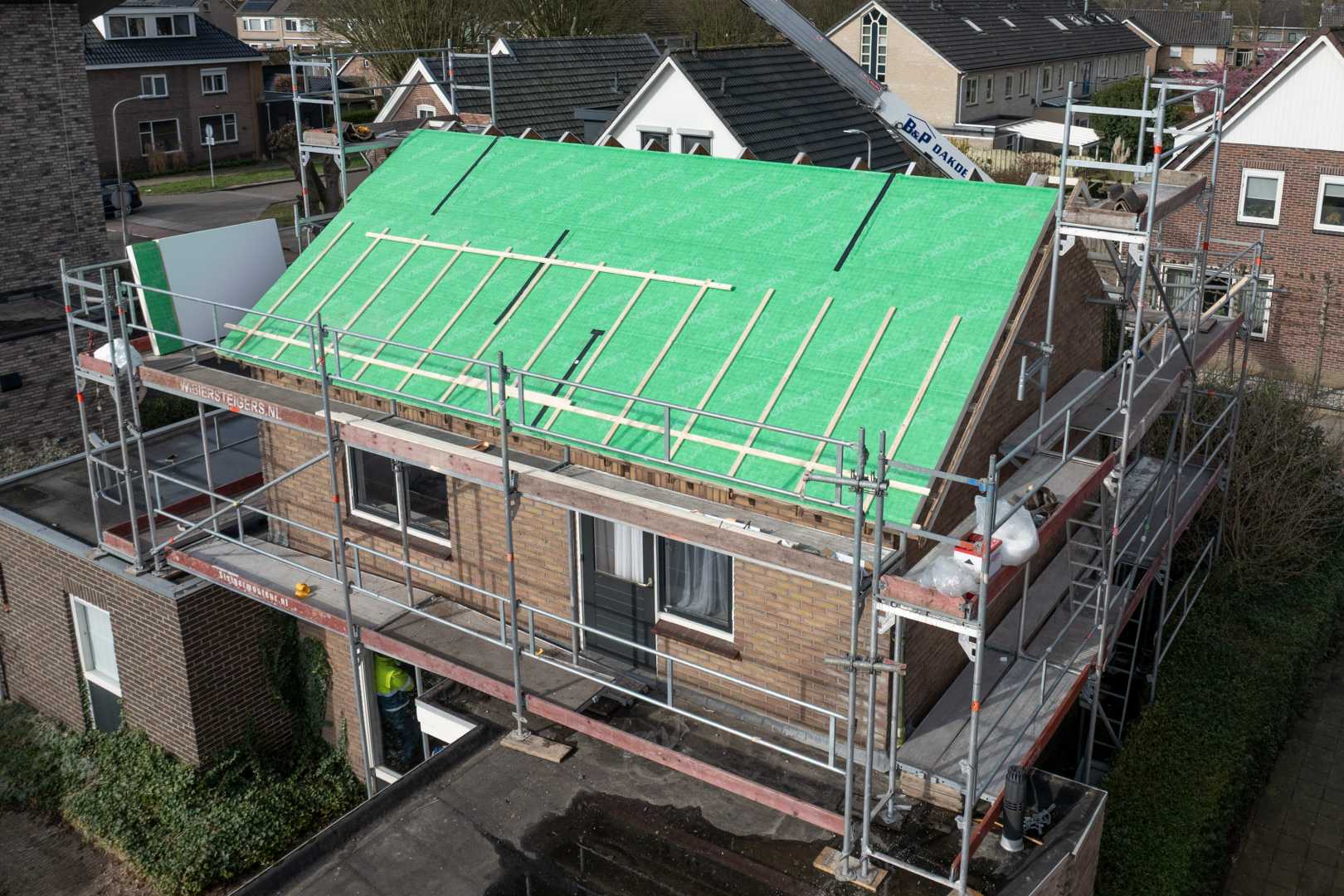 Huis met Unidek Sporen PIR Huis met dakisolatie